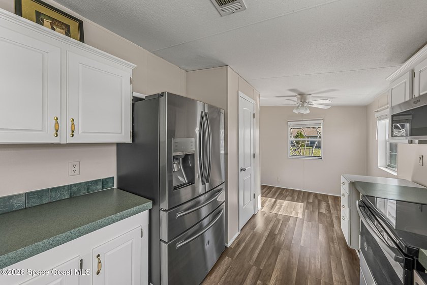 Enjoy this charming 3-bed, 2-bath home in Palm Bay Estates, a - photo 10