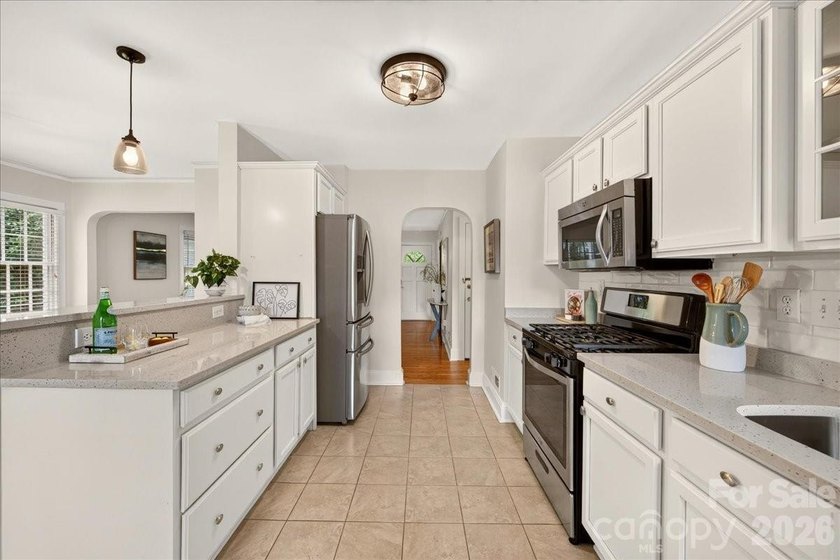 Welcome to 1808 Truman Rd, an updated home brimming with curb - photo 17