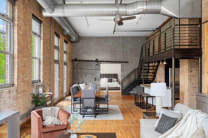 Located in the historic 801 lofts, this authentic loft offers a - photo 2