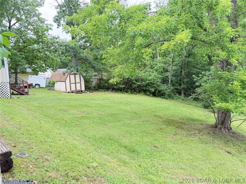Affordable Lake Living Opportunity in the desirable Osage - photo 20
