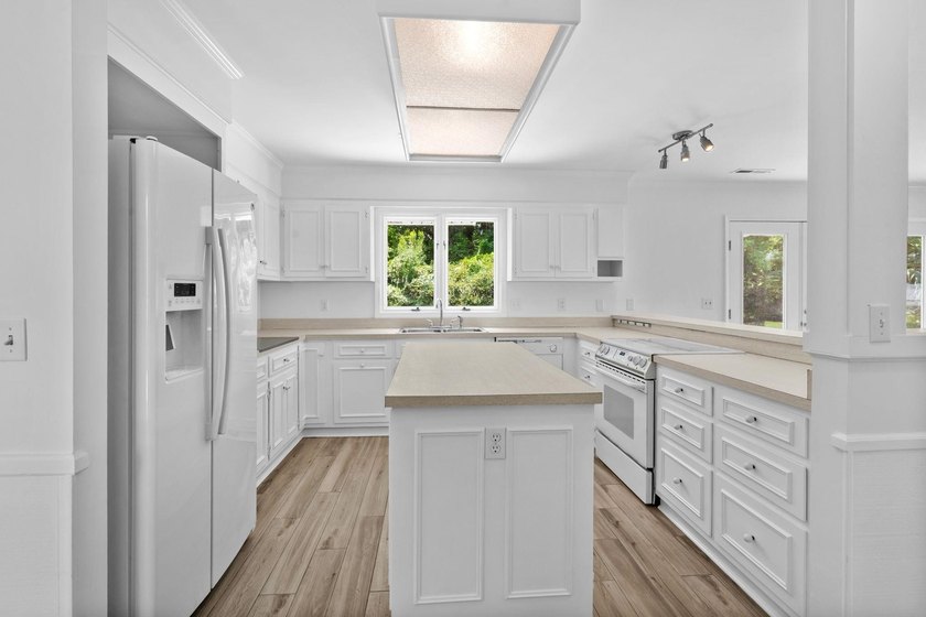 THIS ONE STORY LOVELY HOME IS LOCATED ON 63RD AVENUE NORTH ON - photo 19