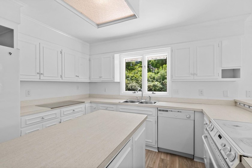 THIS ONE STORY LOVELY HOME IS LOCATED ON 63RD AVENUE NORTH ON - photo 20