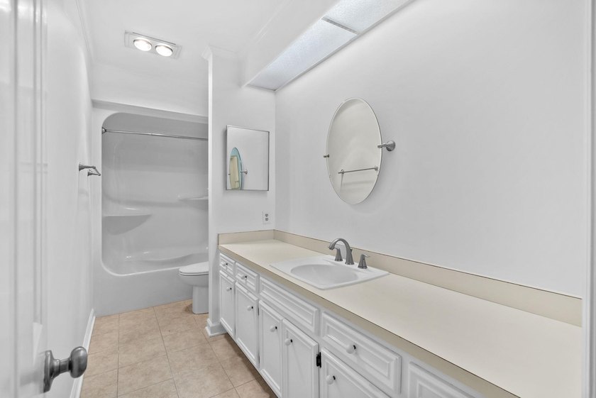 THIS ONE STORY LOVELY HOME IS LOCATED ON 63RD AVENUE NORTH ON - photo 31