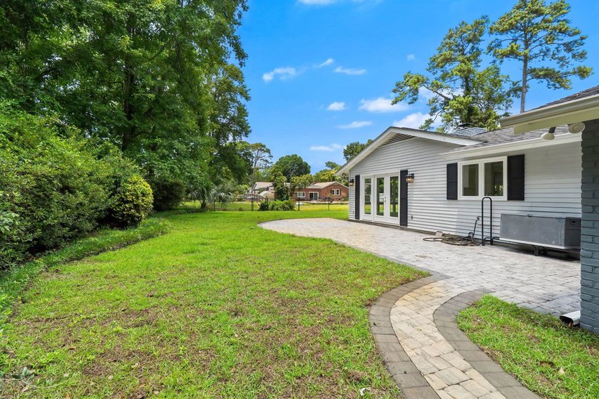 THIS ONE STORY LOVELY HOME IS LOCATED ON 63RD AVENUE NORTH ON - photo 44