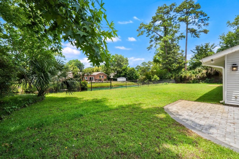 THIS ONE STORY LOVELY HOME IS LOCATED ON 63RD AVENUE NORTH ON - photo 45
