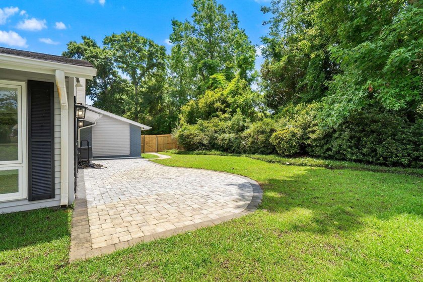 THIS ONE STORY LOVELY HOME IS LOCATED ON 63RD AVENUE NORTH ON - photo 49