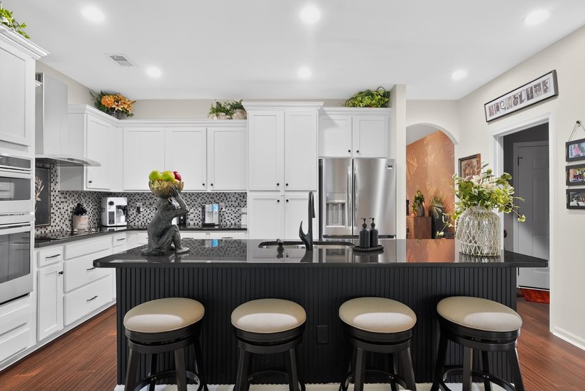 Nestled within the prestigious Preserve at Green Lakes in the - photo 14