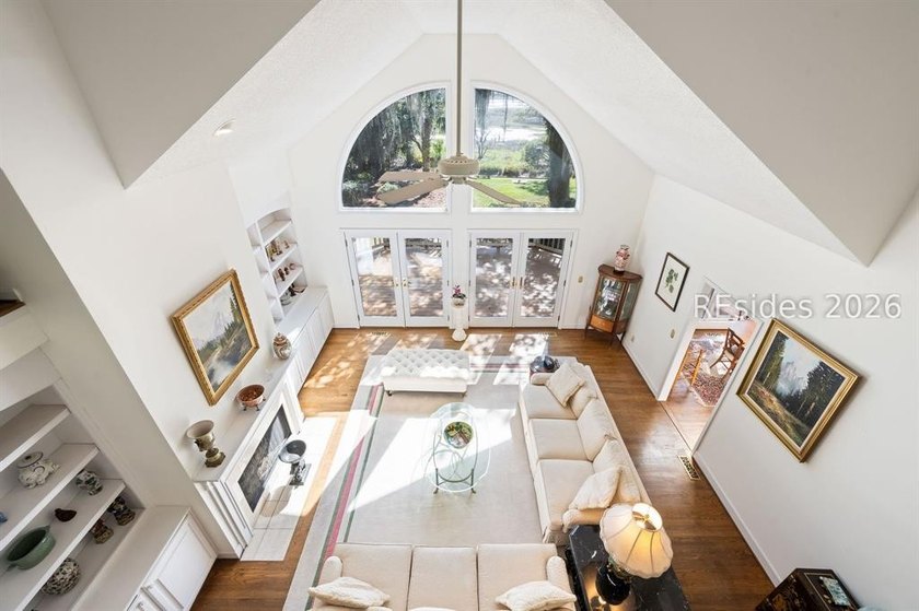 Set against a breathtaking Lowcountry backdrop, this stately - photo 42