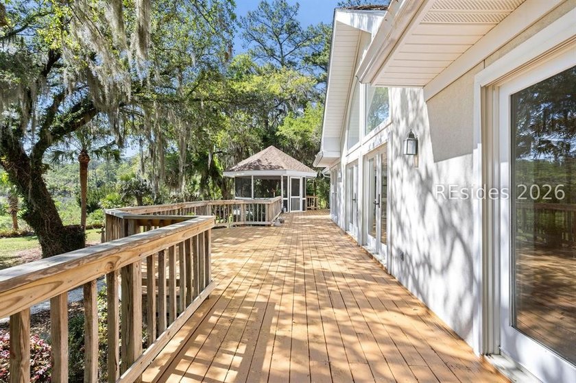 Set against a breathtaking Lowcountry backdrop, this stately - photo 44