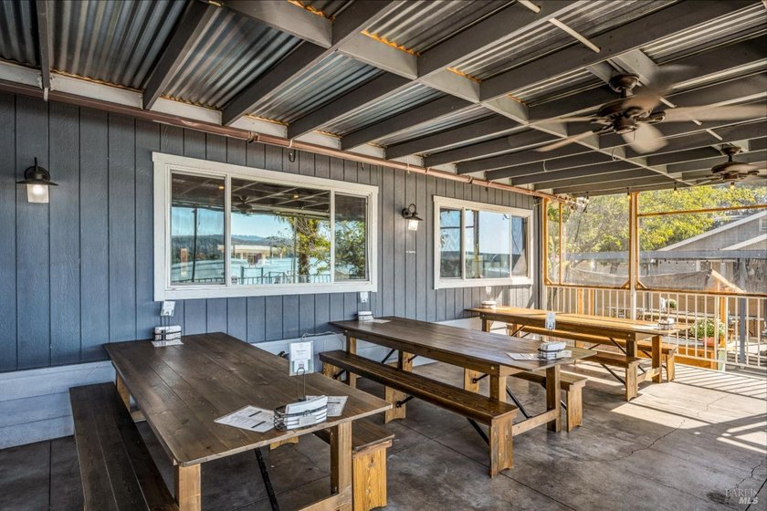 Set on over an acre of pristine Clearlake shoreline, this - photo 11
