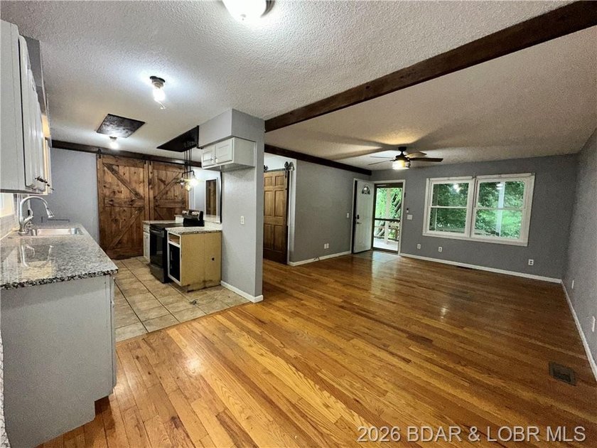 4-bed, 2-bath home in Warsaw featuring an open floor plan - photo 11