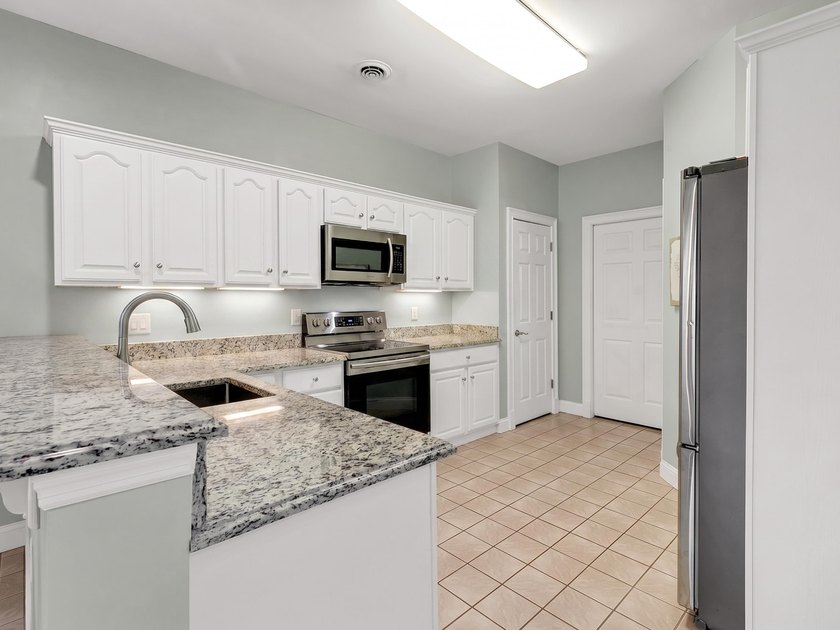 Tucked inside Heritage Plantation, this three-bedroom, two-bath - photo 13