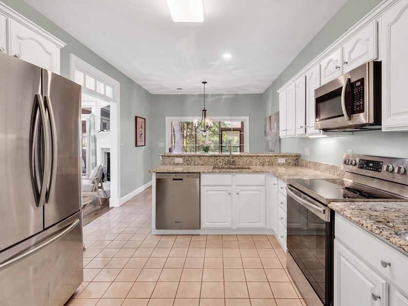 Tucked inside Heritage Plantation, this three-bedroom, two-bath - photo 15