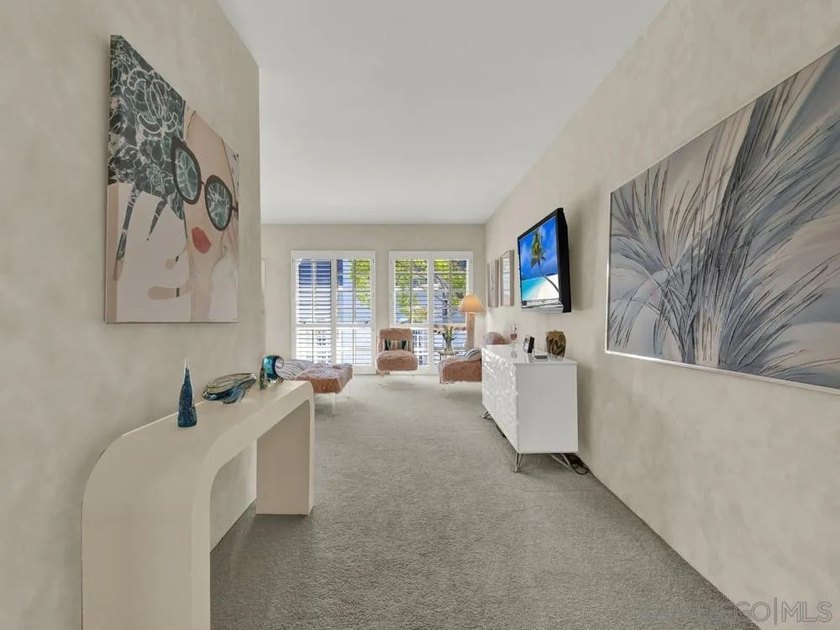 Nestled on a private corner lot within the prestigious gated - photo 14