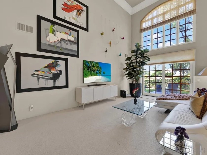 Nestled on a private corner lot within the prestigious gated - photo 17