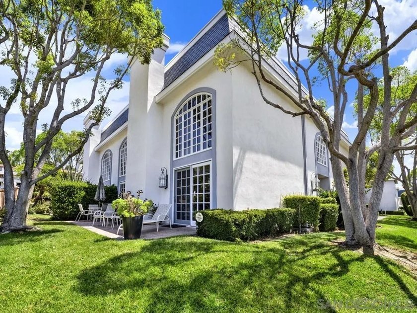 Nestled on a private corner lot within the prestigious gated - photo 19