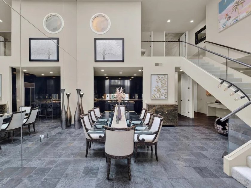Nestled on a private corner lot within the prestigious gated - photo 32
