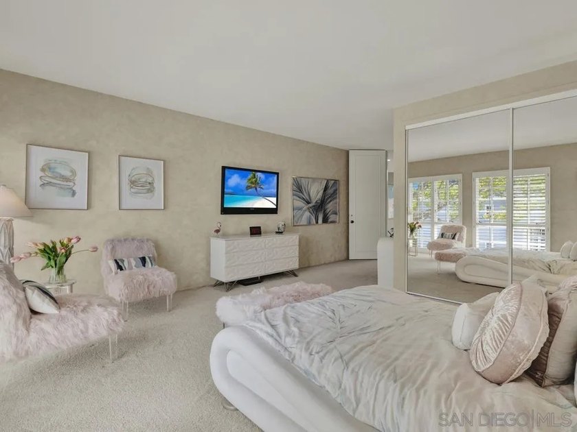 Nestled on a private corner lot within the prestigious gated - photo 34