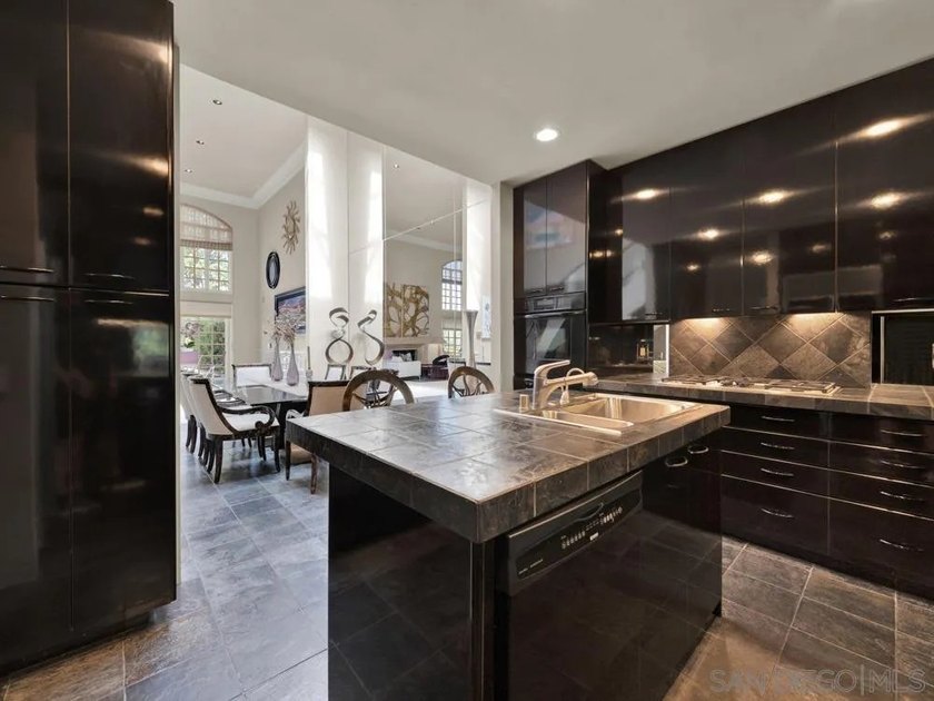 Nestled on a private corner lot within the prestigious gated - photo 38