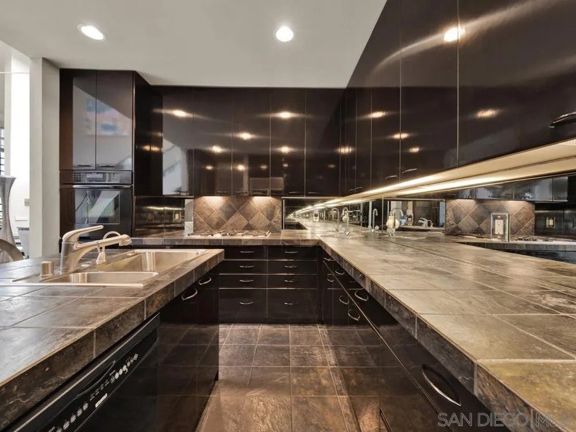 Nestled on a private corner lot within the prestigious gated - photo 39