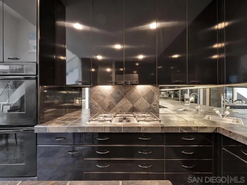 Nestled on a private corner lot within the prestigious gated - photo 42