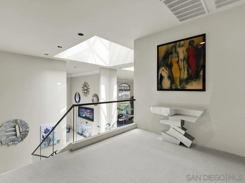 Nestled on a private corner lot within the prestigious gated - photo 45