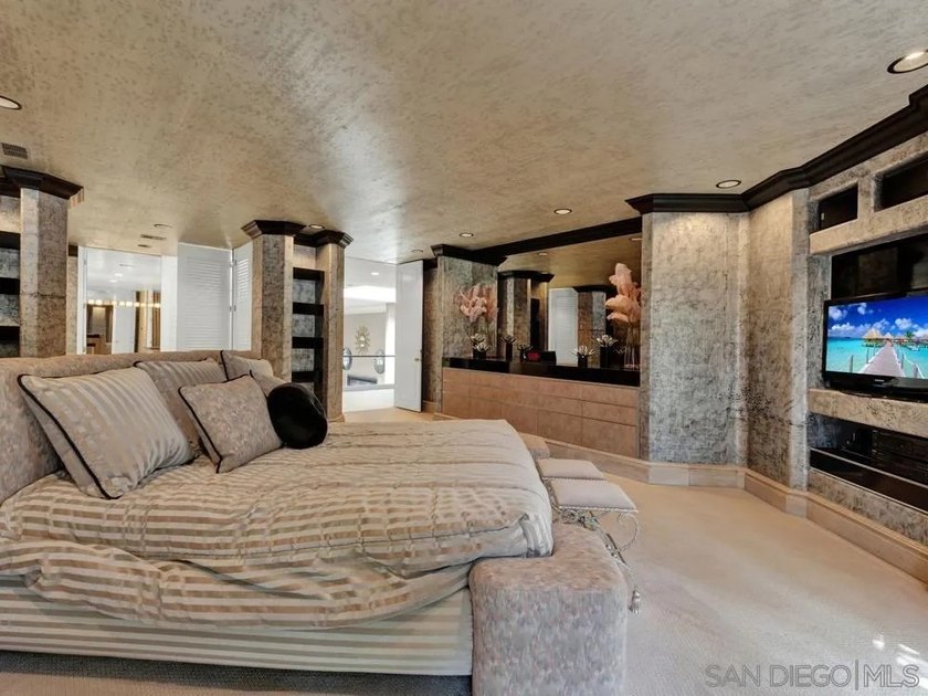 Nestled on a private corner lot within the prestigious gated - photo 50