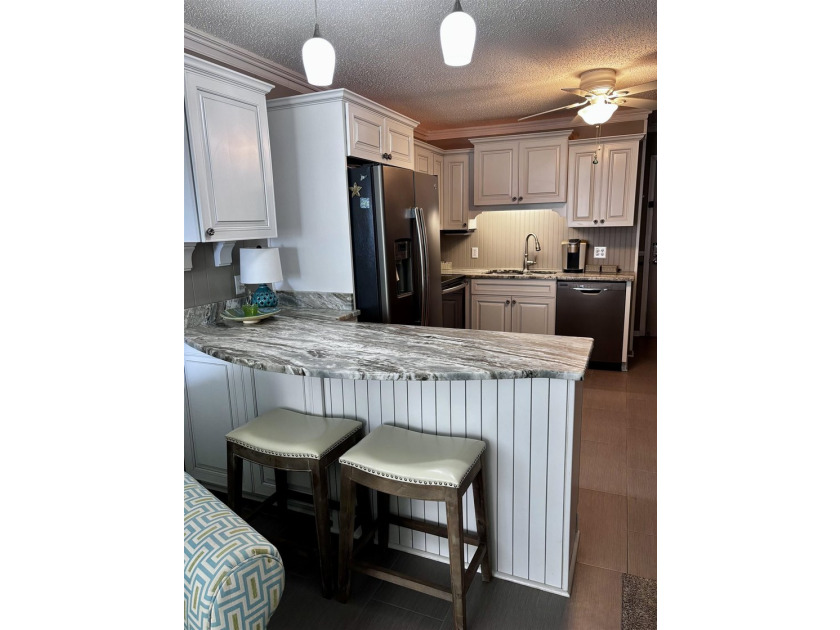 This is the condo that you've been waiting for! Beautifully - photo 14