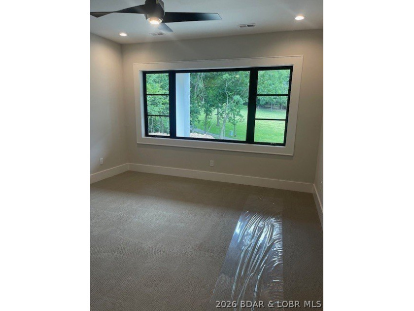 WOW Setting! New Construction! Sitting on over 1/2 an acre, this - photo 37