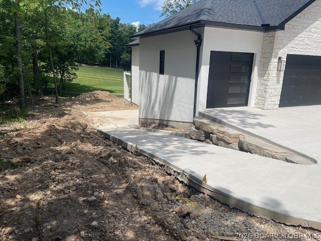 WOW Setting! New Construction! Sitting on over 1/2 an acre, this - photo 46