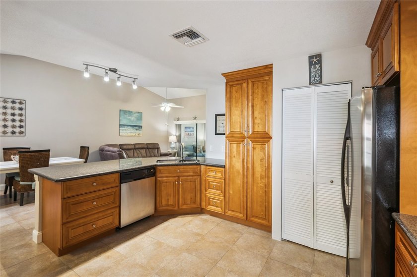 This beautifully updated villa-style home features an open - photo 5
