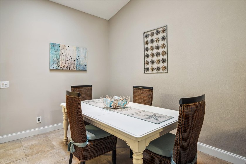This beautifully updated villa-style home features an open - photo 6