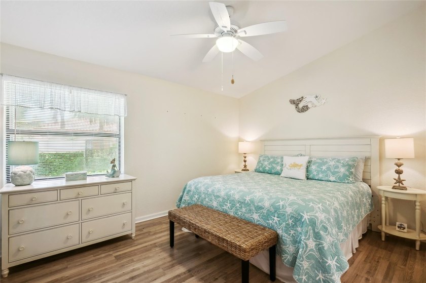 This beautifully updated villa-style home features an open - photo 9
