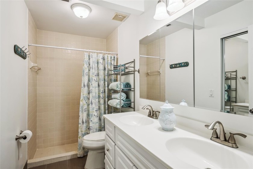 This beautifully updated villa-style home features an open - photo 10