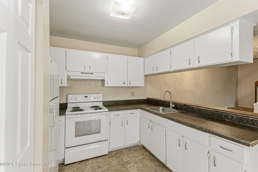 Opportunity awaits in this spacious 3-bed, 2-bath end-unit - photo 10