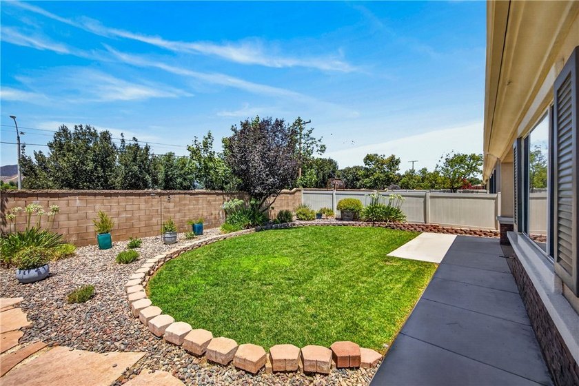 Welcome to this beautifully maintained single-story home located - photo 31