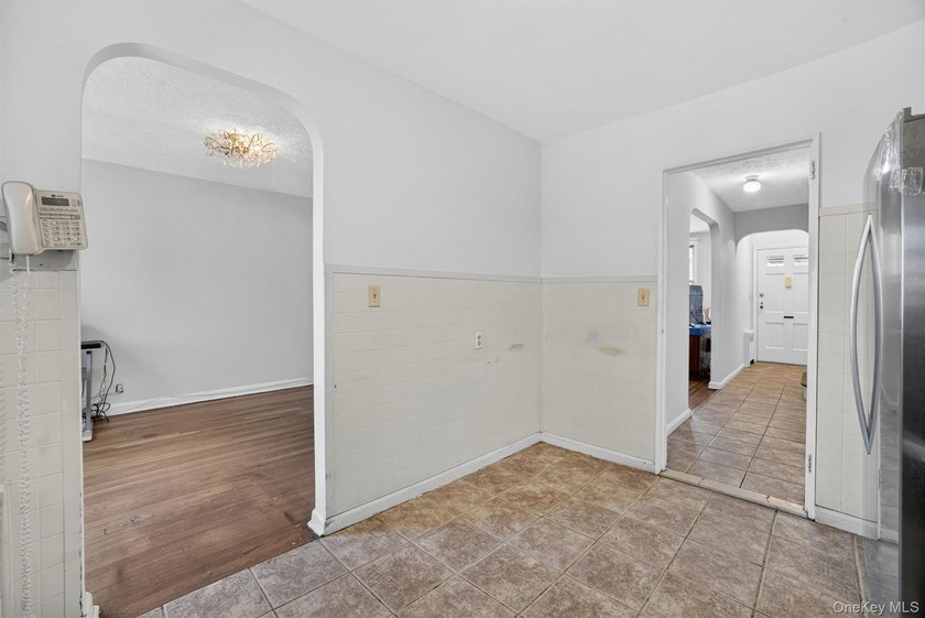 Refreshed and charming 3-bedroom tri-level brick home features a - photo 12