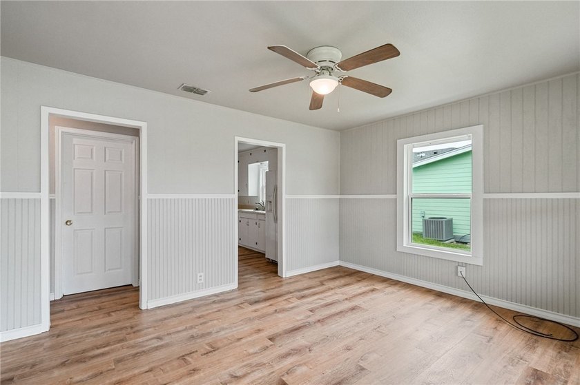 Move-in ready and beautifully remodeled, this charming 3-bedroom - photo 3