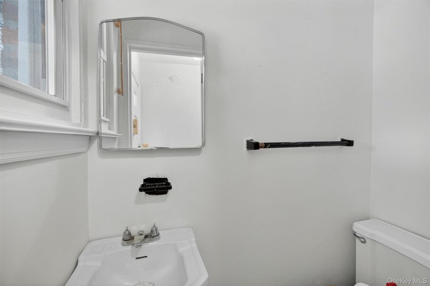 Refreshed and charming 3-bedroom tri-level brick home features a - photo 13