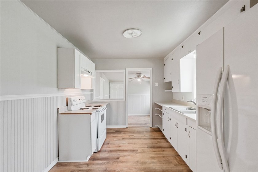 Move-in ready and beautifully remodeled, this charming 3-bedroom - photo 6