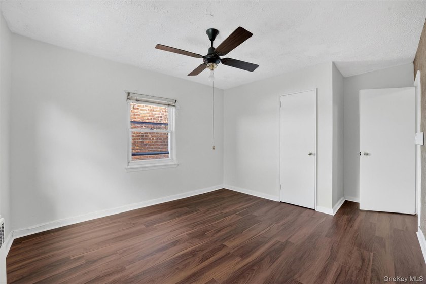 Refreshed and charming 3-bedroom tri-level brick home features a - photo 17