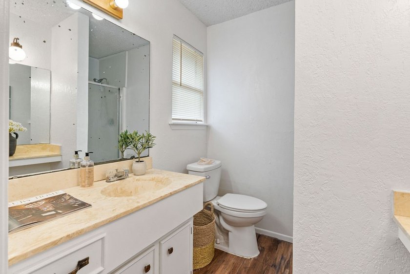 Welcome home to comfort, character, and convenience in the - photo 9
