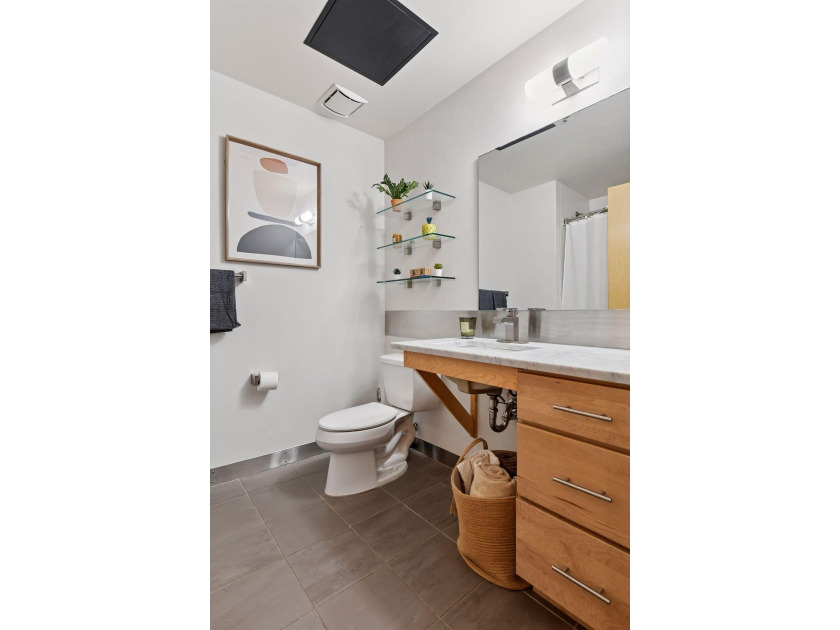 Welcome to this stunning one bedroom + den condo at the historic - photo 18