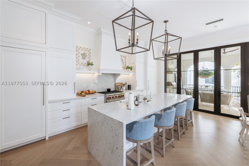 Located in Coral Gables on a picturesque tree-lined street, this - photo 13