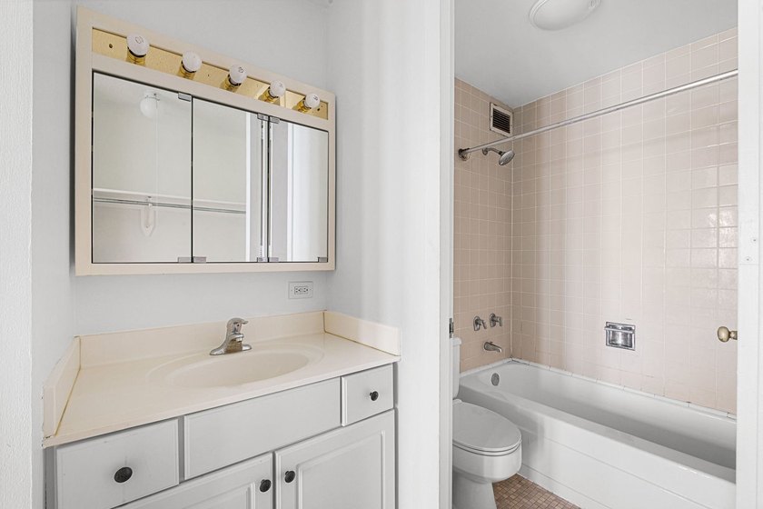 Stunning lake and skyline views await in this spacious - photo 13