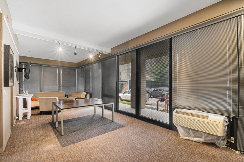 Stunning lake and skyline views await in this spacious - photo 17