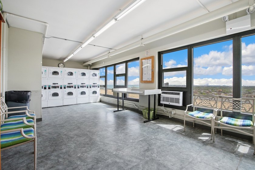 Stunning lake and skyline views await in this spacious - photo 19