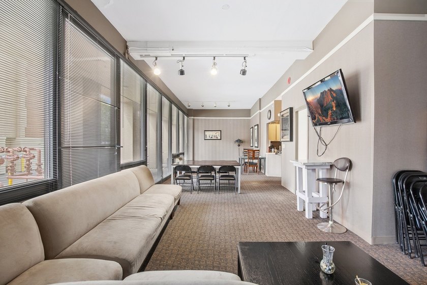 Stunning lake and skyline views await in this spacious - photo 20