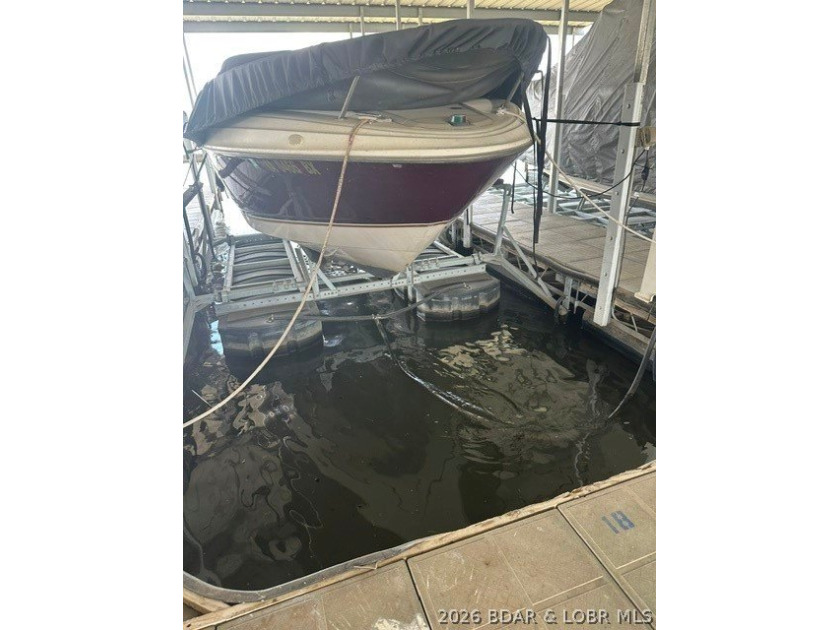 36 Foot Boat Slip with Polylift Hoist, a PWC Slip and a fully - photo 49