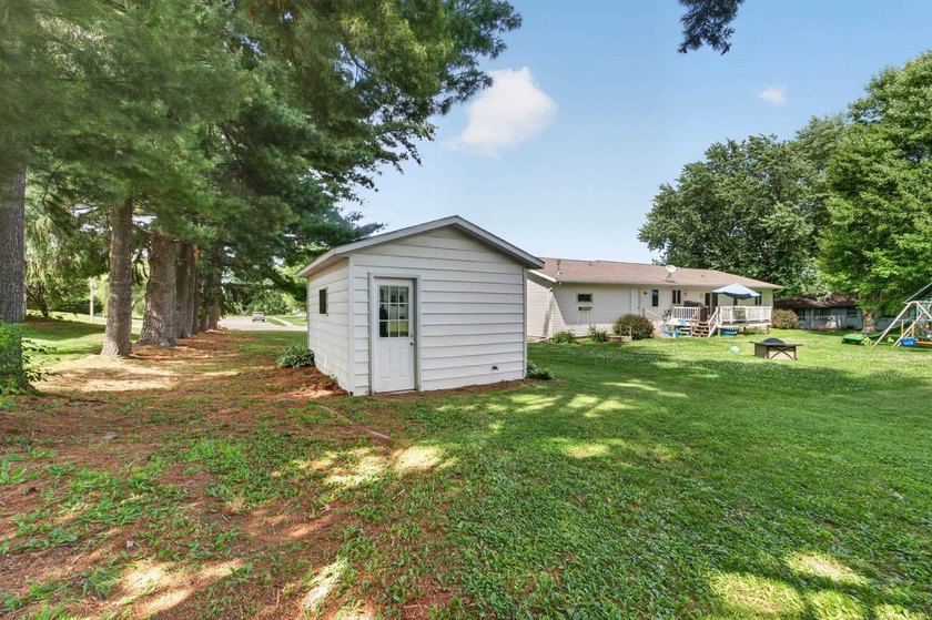 Welcome home to this charming 3-bedroom ranch in the heart of - photo 33
